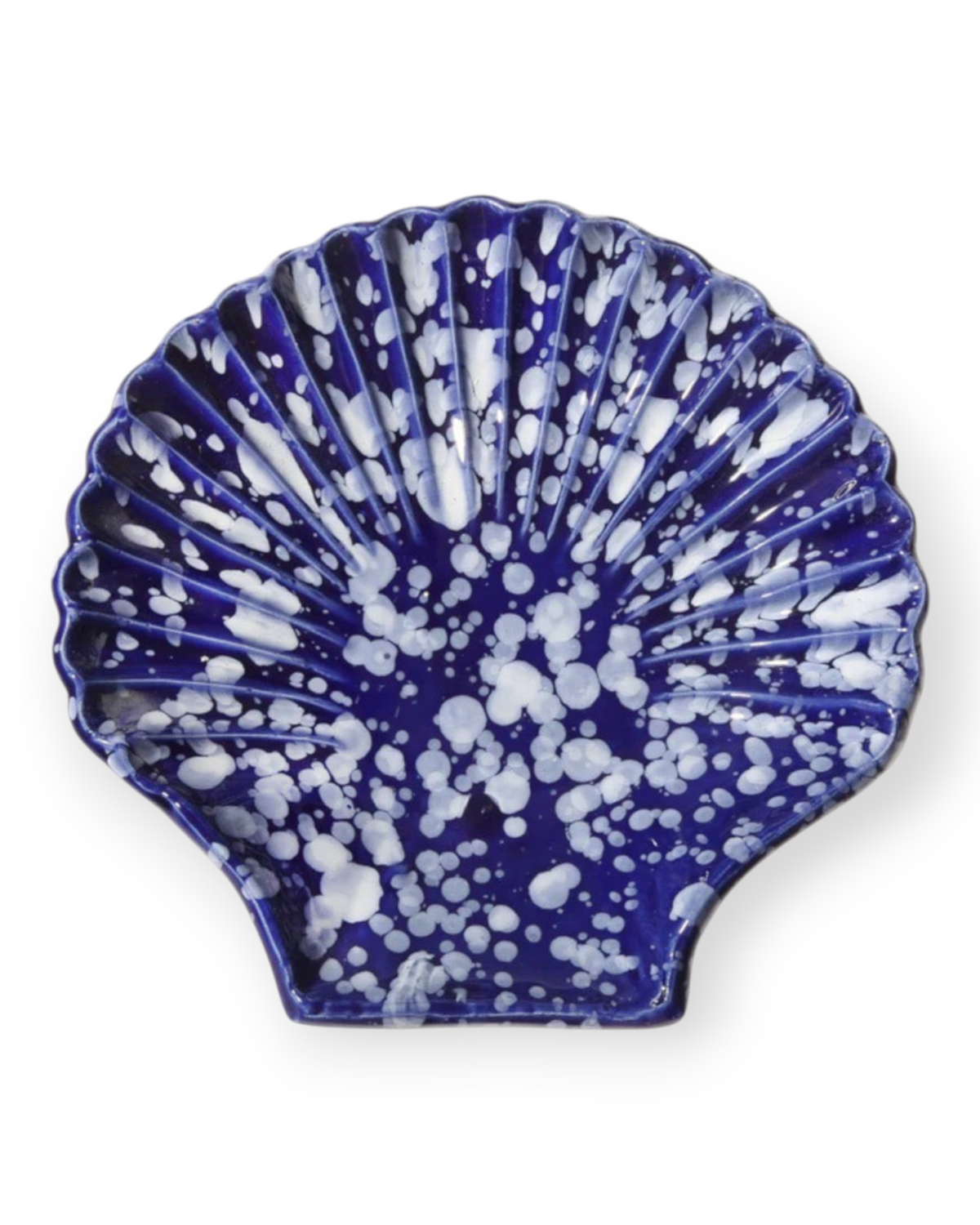 Birdie by Nina Liddle Design Concha ceramic dessert plate in a deep blue shell shape with white speckled detailing.