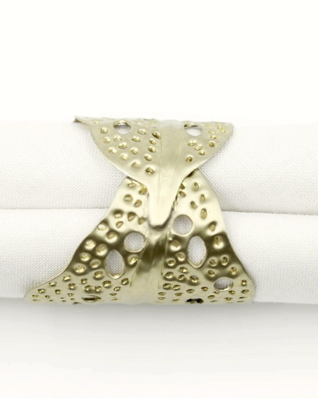 Birdie by Nina Liddle Design gold-toned metal sea kelp napkin ring with textured leaf pattern and cutouts