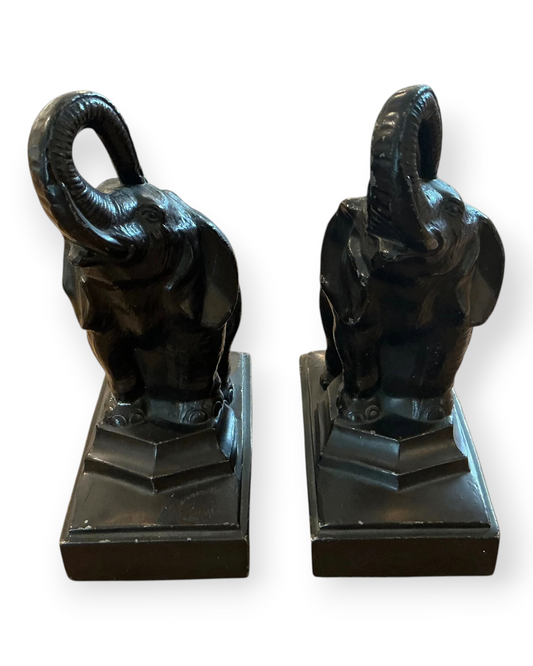 Birdie by Nina Liddle Design vintage brass elephant bookends with trunks raised on rectangular bases