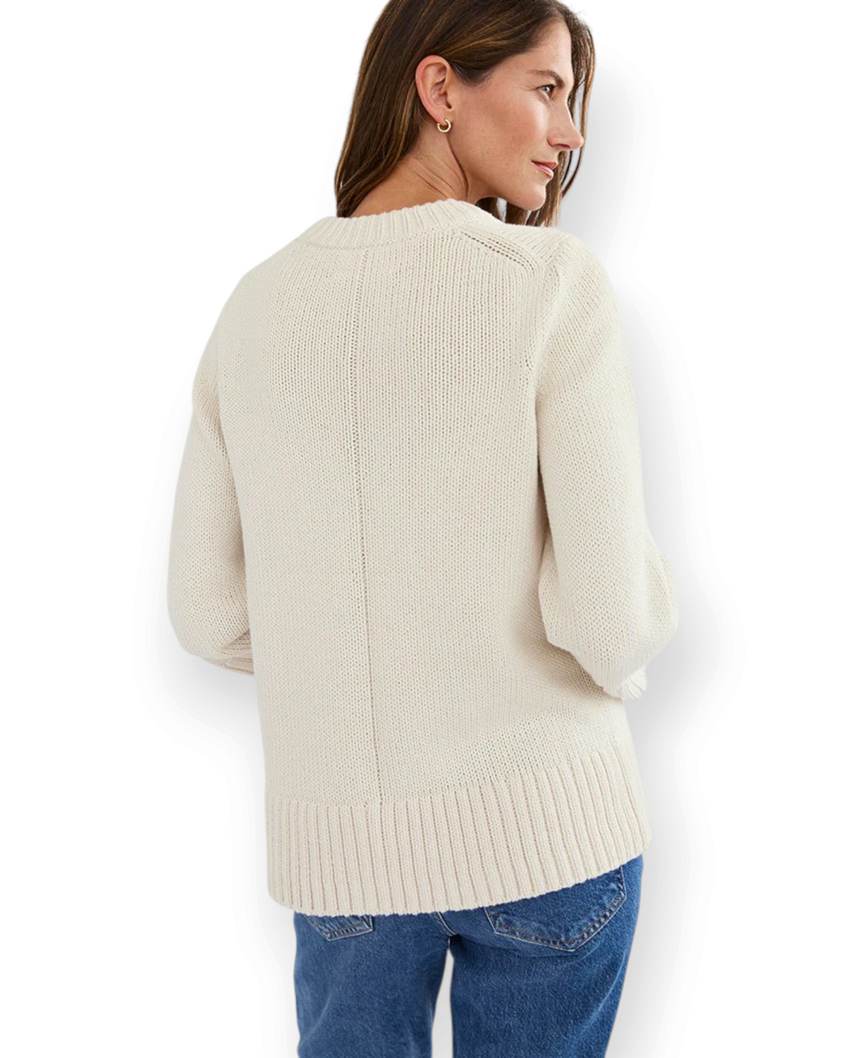 Back view of a woman wearing a cream Birdie by Nina Liddle Design Kittery Crewneck sweater with ribbed hem and cuffs.