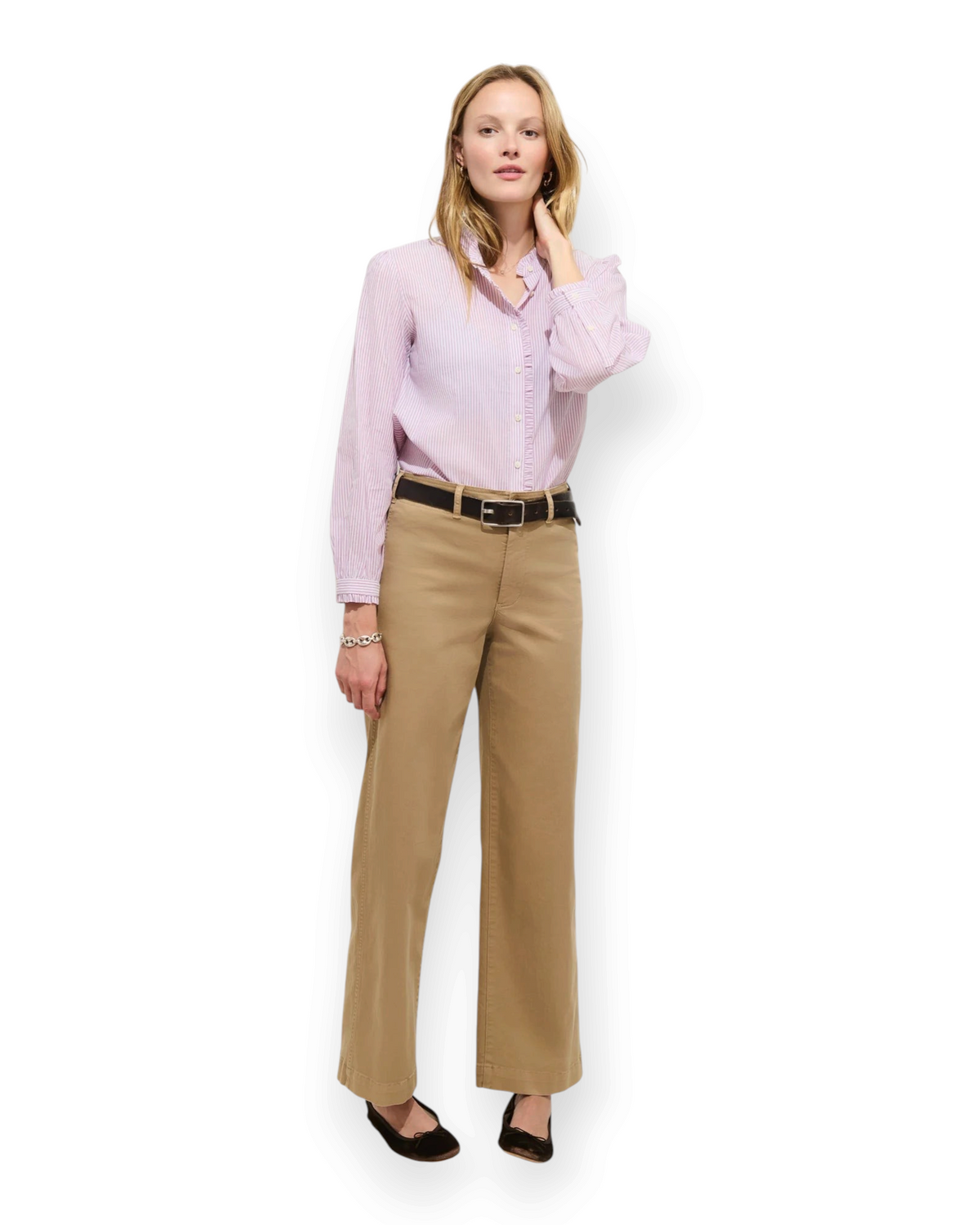 Birdie by Nina Liddle Design Chantilly striped cotton shirt with ruffle cuffs worn by a model with khaki trousers