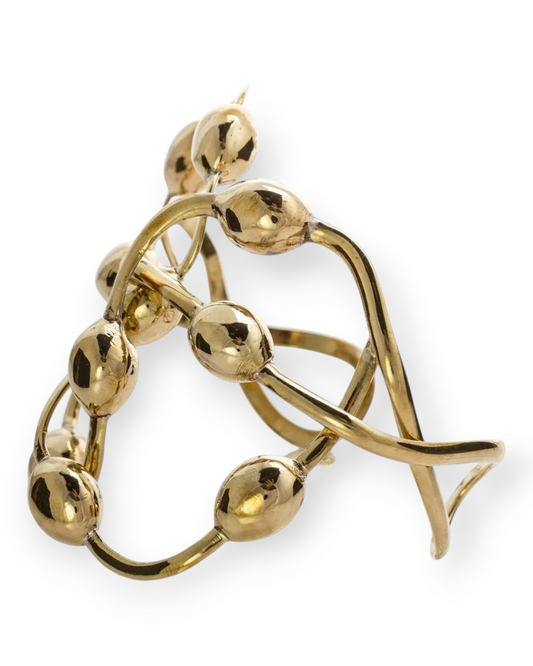 Birdie by Nina Liddle Design gold seaweed cuff bracelet with organic twisted shapes and polished metallic finish