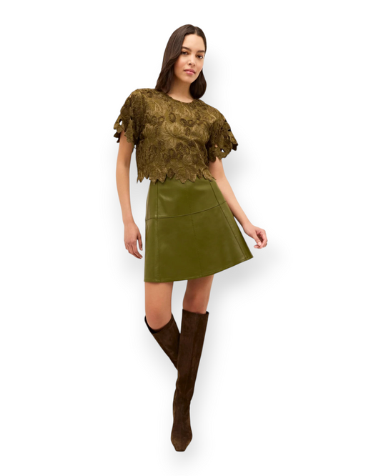 Birdie by Nina Liddle Design Pelumi top in clover green cotton with embroidered cut-out sleeves and a keyhole back.