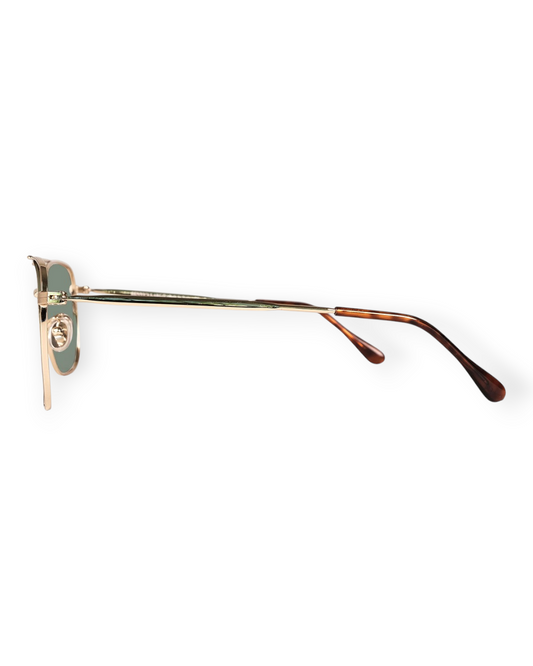 Birdie by Nina Liddle Design Largo sunglasses with gold metal frames and tortoiseshell temple tips, side view.