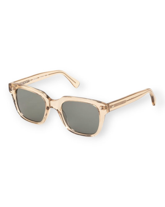 Birdie by Nina Liddle Design Lincoln sunglasses with wide fit, translucent champagne frames, and double rivet details.