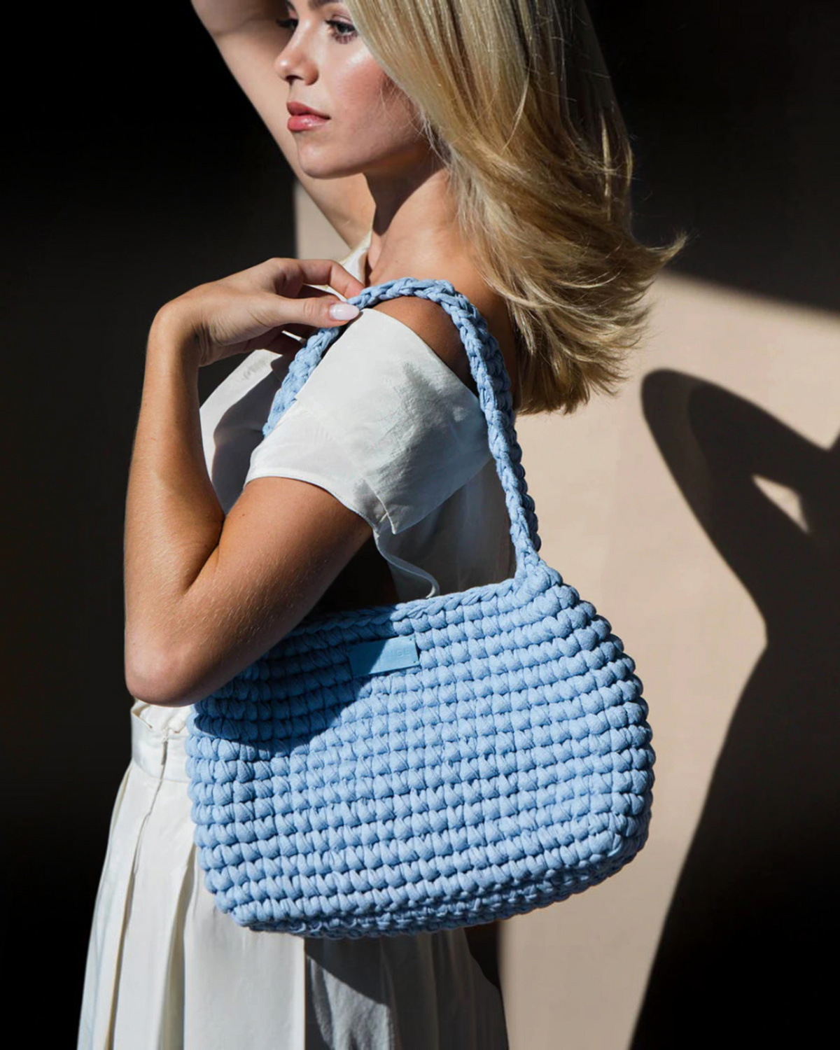 Birdie by Nina Liddle Design Valentina shoulder bag in light blue handcrafted recycled cotton with a woven texture.