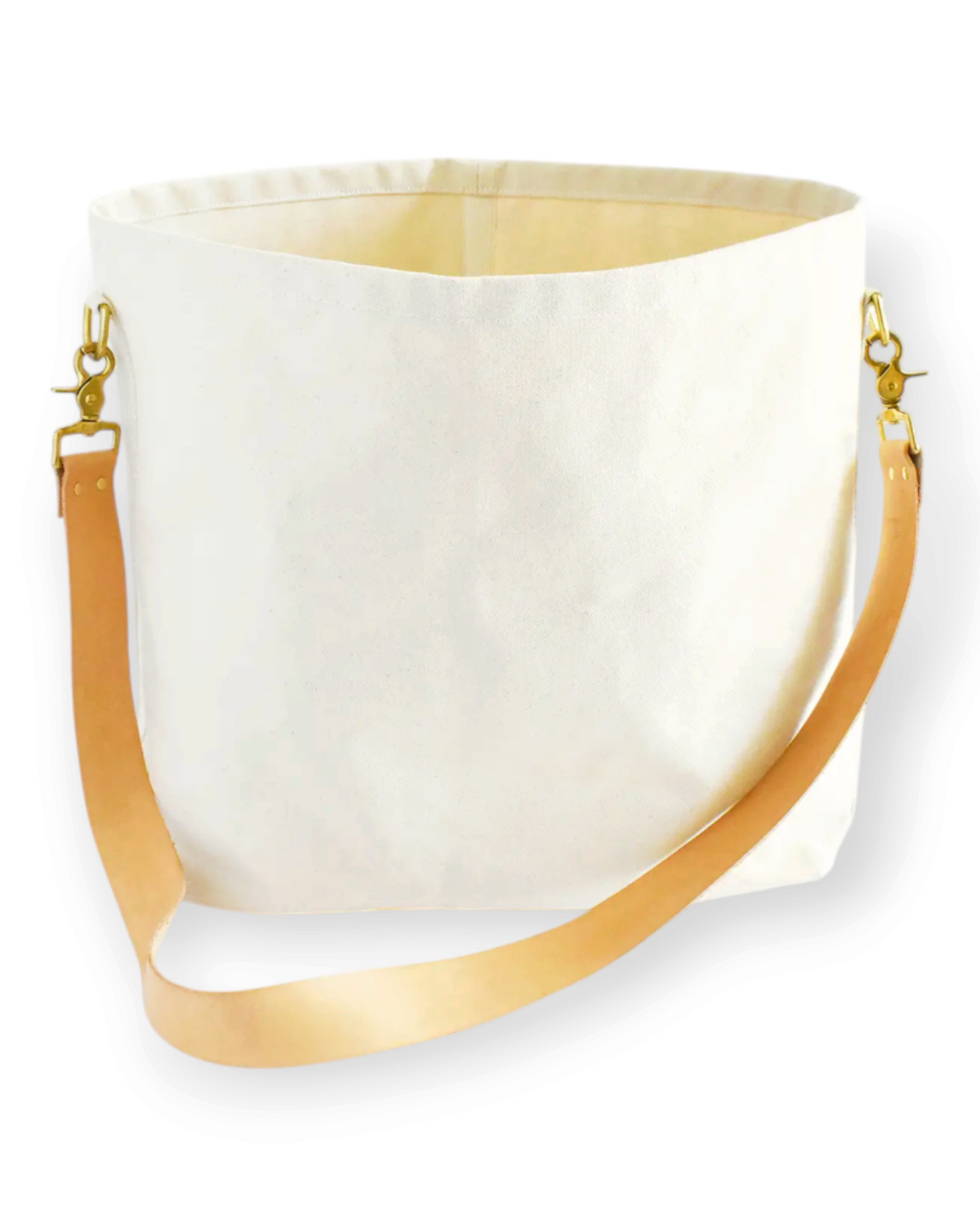 Birdie by Nina Liddle Design canvas tote bag with a detachable tan leather strap and brass hardware