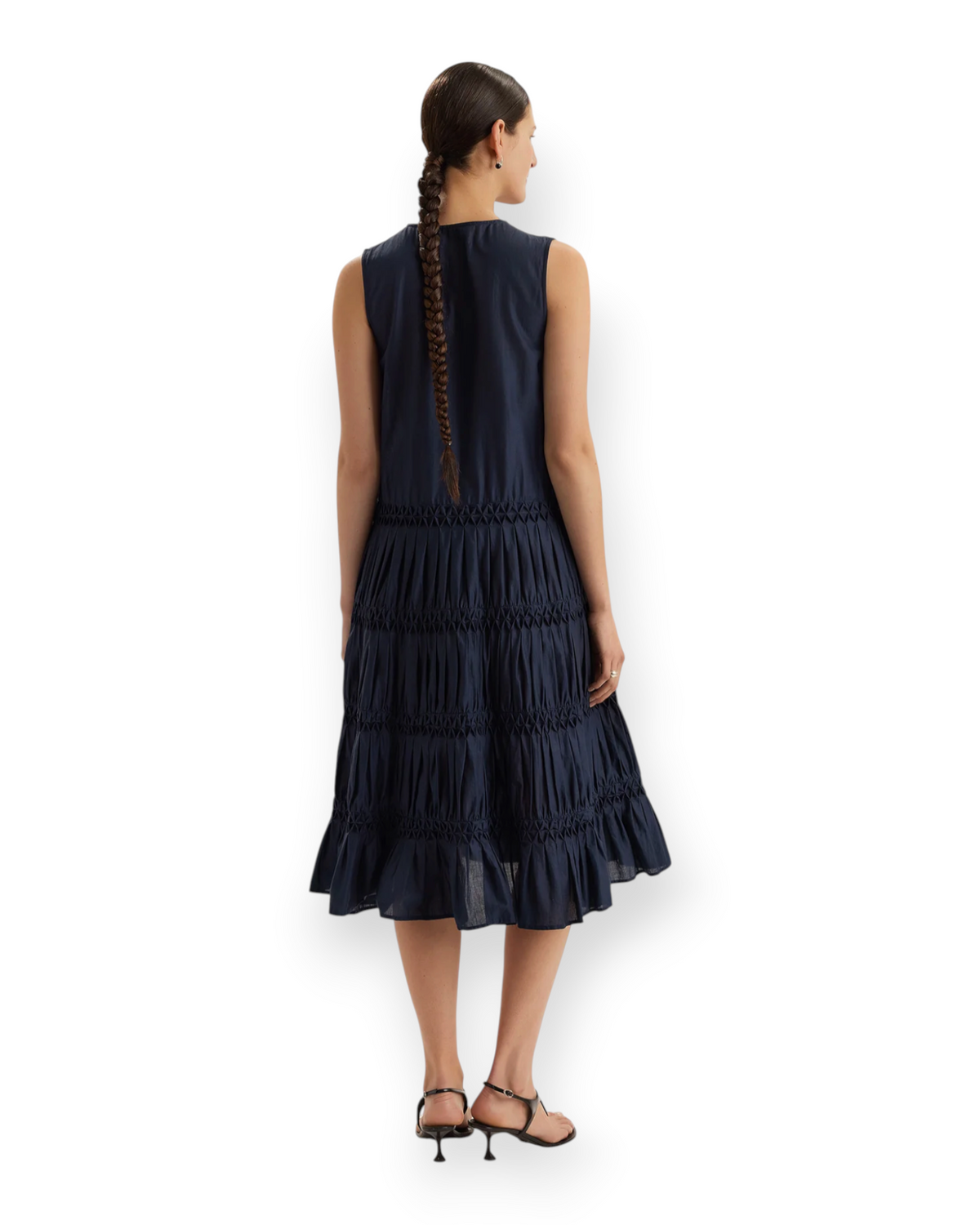 Back view of Birdie by Nina Liddle Design Wallis midi dress in navy Pima cotton with tiered skirt and smocked detail.