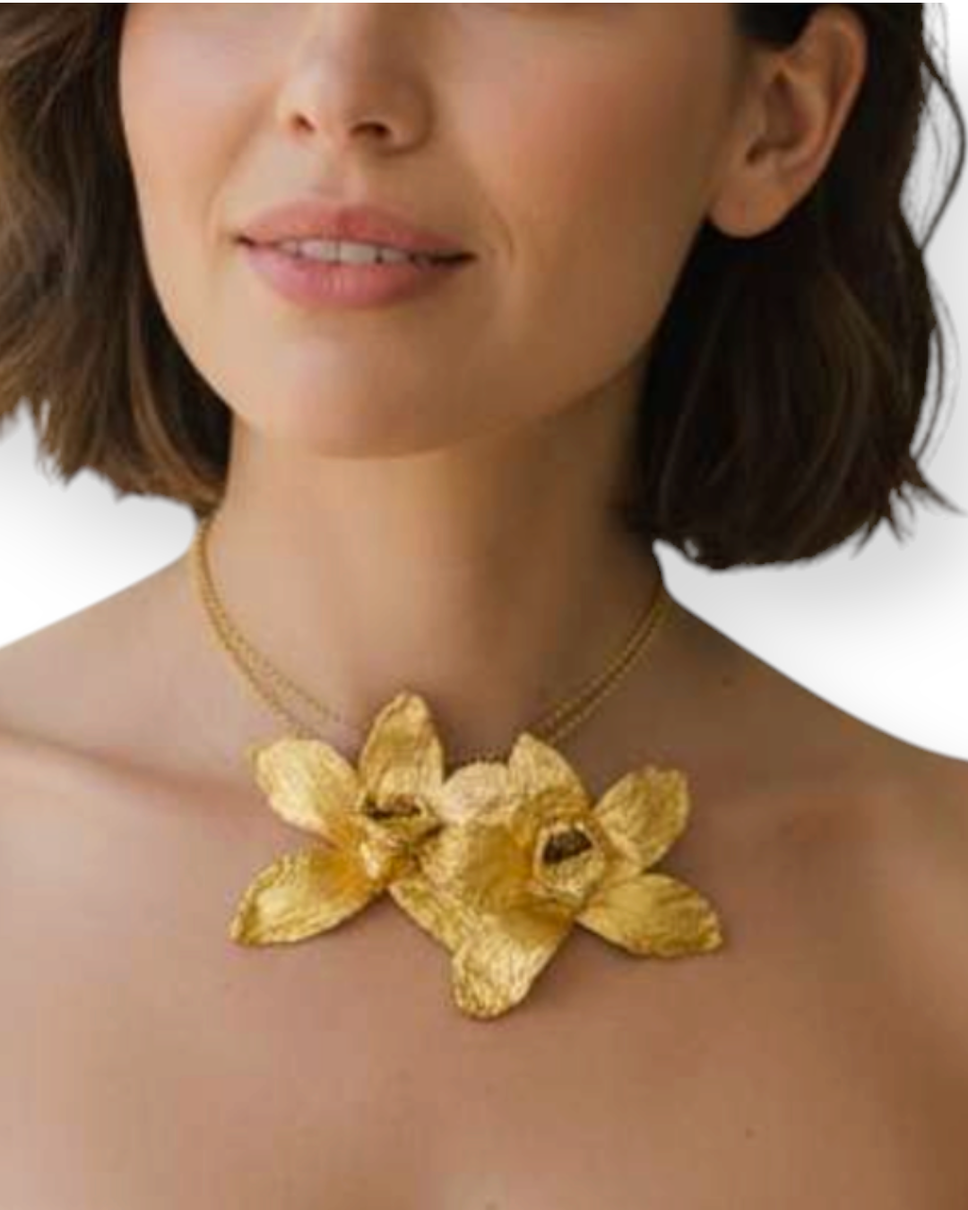 Birdie by Nina Liddle Design gold-plated orchid necklace featuring two natural flowers on a delicate chain