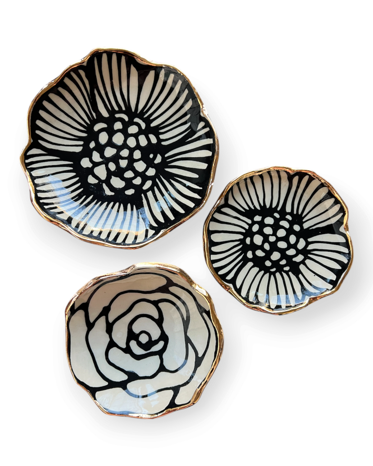 Birdie by Nina Liddle Design handmade stoneware flower jewelry dishes with black and white floral art and gold rims.