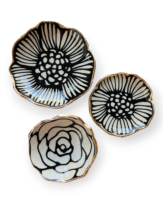 Birdie by Nina Liddle Design handmade stoneware flower jewelry dishes with black and white floral art and gold rims.