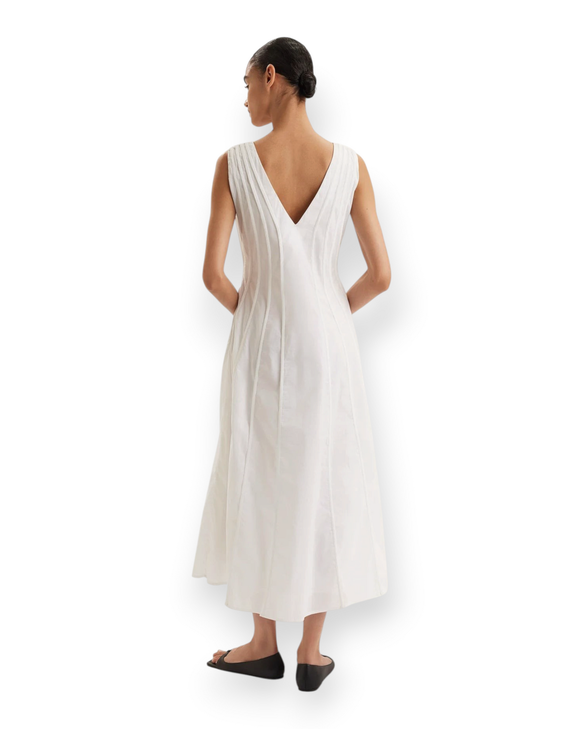Birdie by Nina Liddle Design white sleeveless Pima cotton lawn tea-length Raas dress, back view with seam detailing.