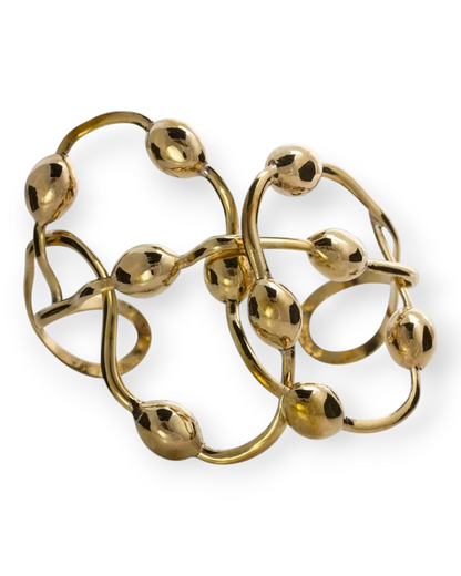 Birdie by Nina Liddle Design gold Seaweed Cuff bracelet featuring an organic, twisted design with polished spheres.