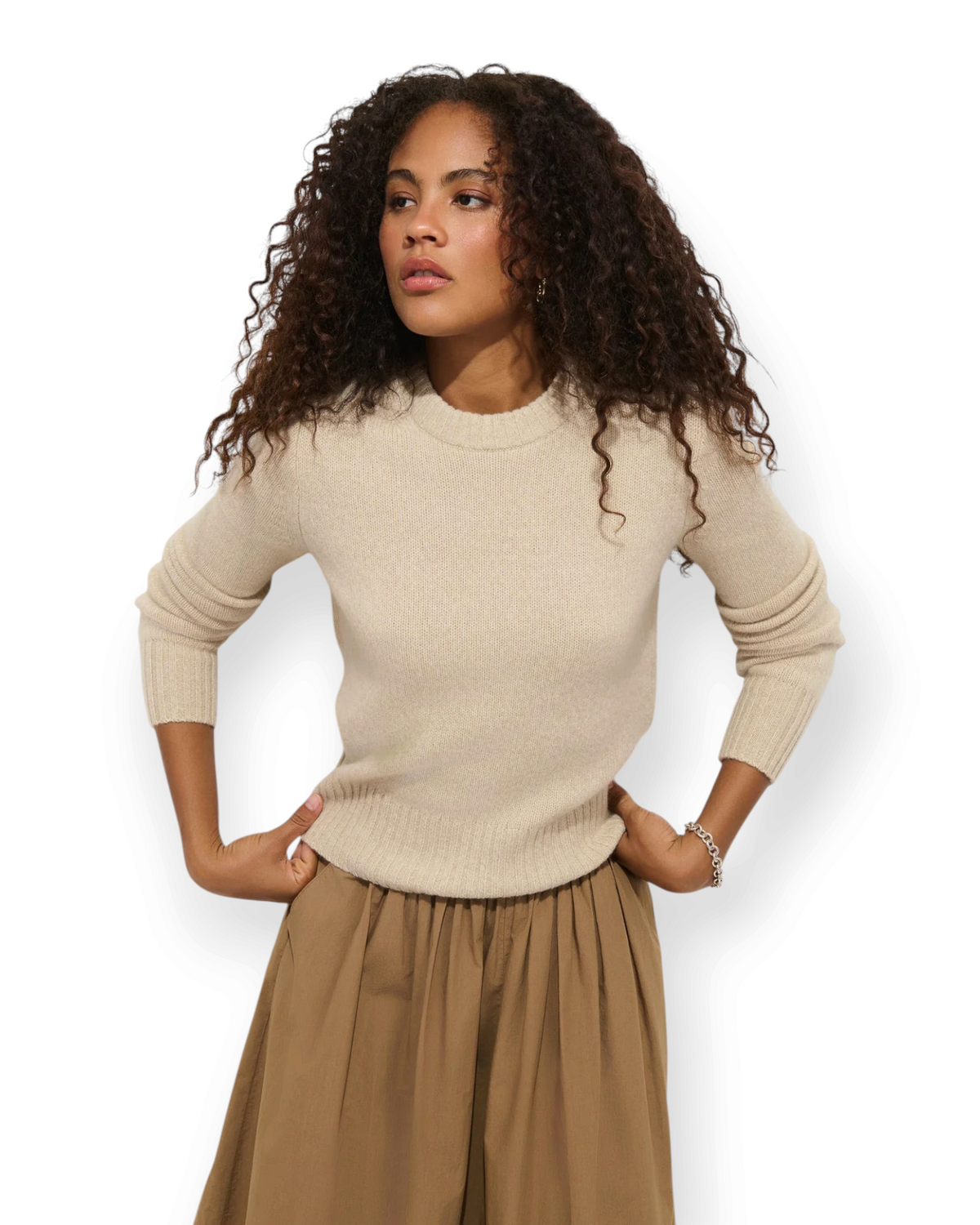 Birdie by Nina Liddle Design Marais washed cashmere sweater in beige with a crew neck worn by a model