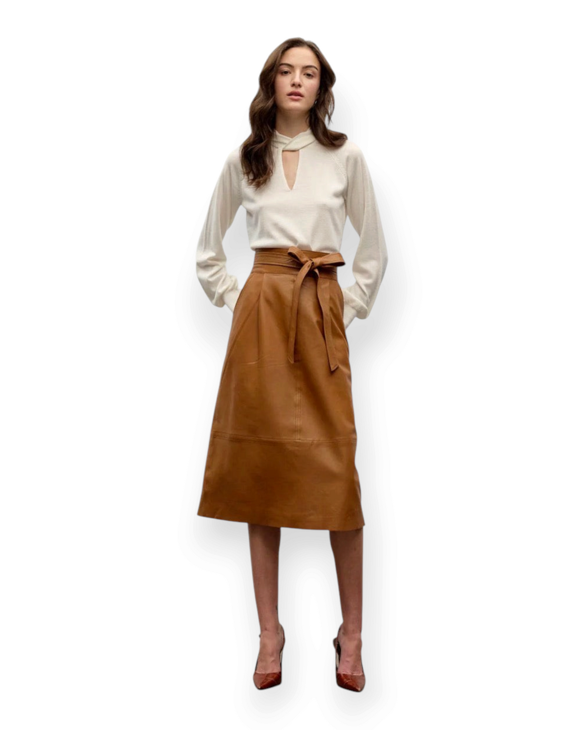 Birdie by Nina Liddle Design tan lambskin leather midi skirt with front pleats, waist belt, and raw-edge hem.