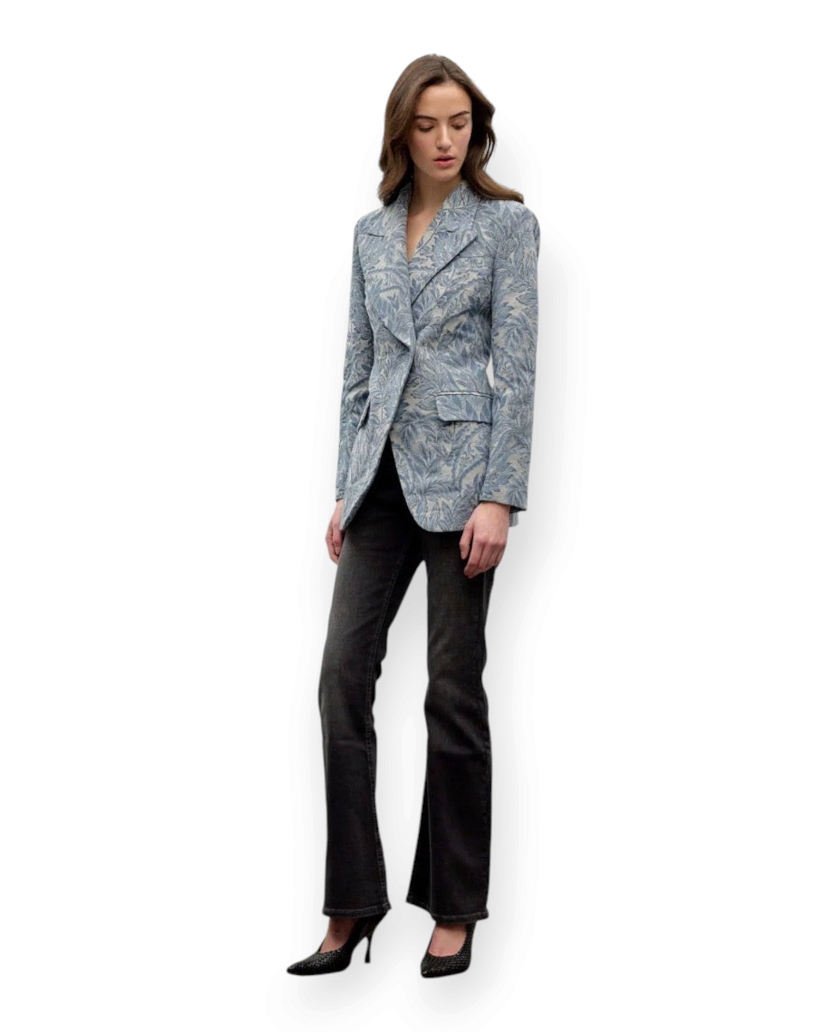 Model wearing a Birdie by Nina Liddle Design blue floral jacquard single breast blazer with structured shoulders.