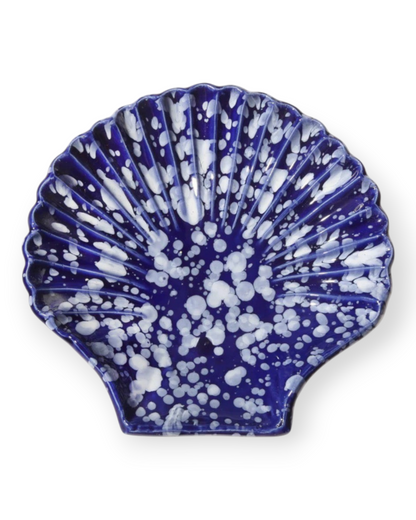 Birdie by Nina Liddle Design Concha ceramic dessert plate in a deep blue shell shape with white speckled detailing.