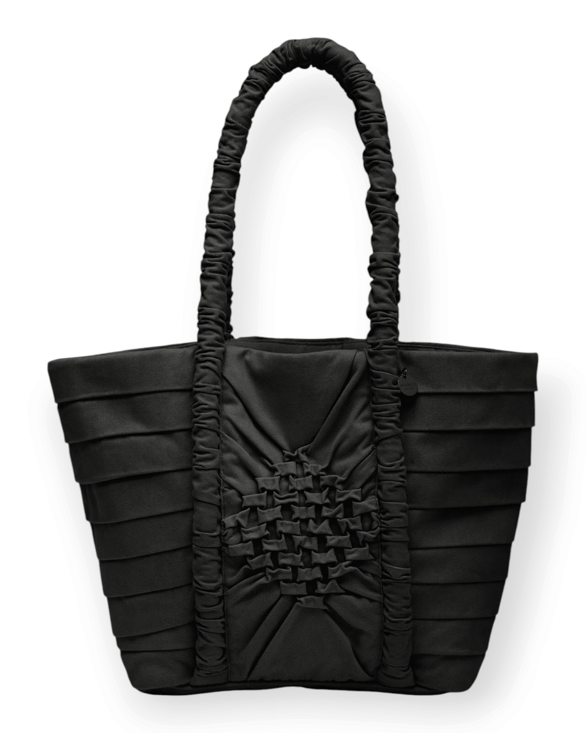 Birdie by Nina Liddle Design black cotton twill Miren bag with geometric smocking and a ruched handle.
