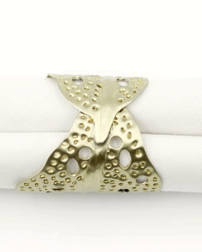 Birdie by Nina Liddle Design gold-toned metal sea kelp napkin ring with textured leaf pattern and cutouts