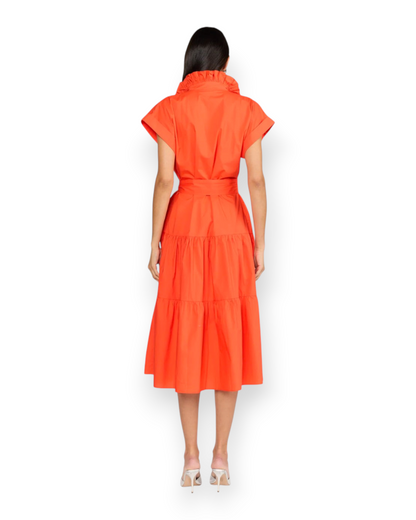 Back view of Birdie by Nina Liddle Design Jonah dress in bright orange cotton poplin with ruffled collar and belt.