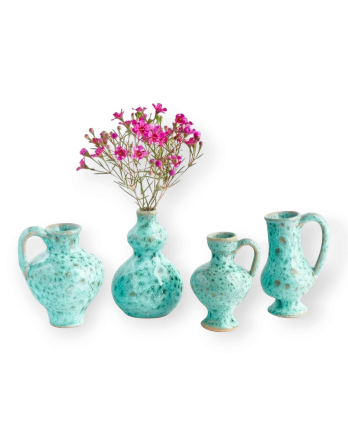 Birdie by Nina Liddle Design set of four handmade turquoise ceramic bud vases with speckled finish and Greek design