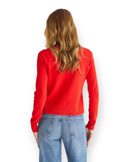 Birdie by Nina Liddle Design red Egyptian cotton cardigan worn by a model, back view showing slim fit and ribbed hem.