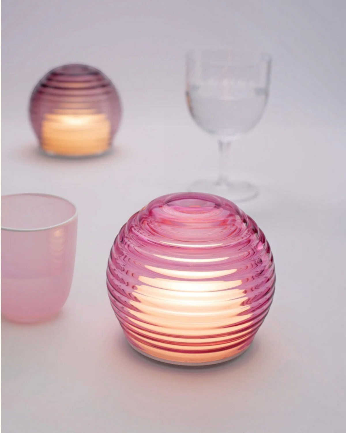 Birdie by Nina Liddle Design handblown pink Murano glass portable LED table light with concentric ring texture