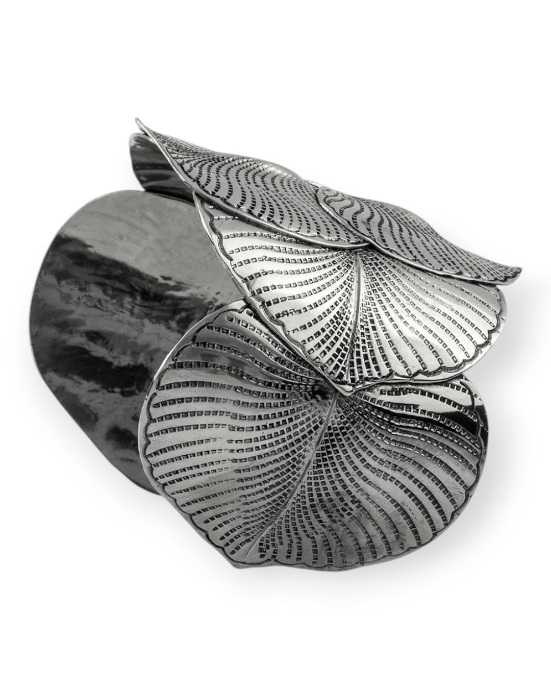 Birdie by Nina Liddle Design eucalyptus leaf cuff bracelet in metallic silver with intricate textured detailing.