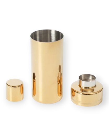 Birdie by Nina Liddle Design brass cocktail shaker with removable lid and strainer in a polished gold finish