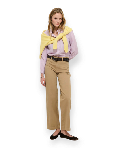 Birdie by Nina Liddle Design Chantilly striped cotton shirt with ruffle cuffs, styled with a yellow sweater and pants