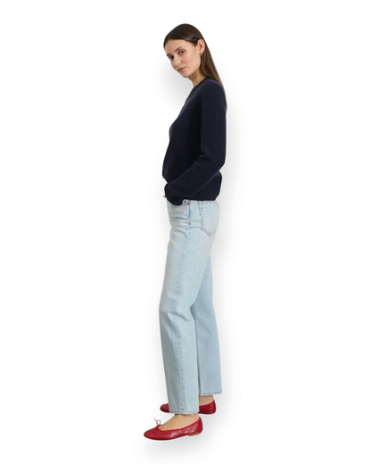 Birdie by Nina Liddle Design Marais sweater in navy washed cashmere worn with light wash jeans and red ballet flats