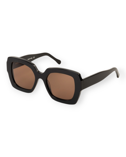Birdie by Nina Liddle Design Ann oversized black sunglasses with brown lenses, handcrafted in Italy.