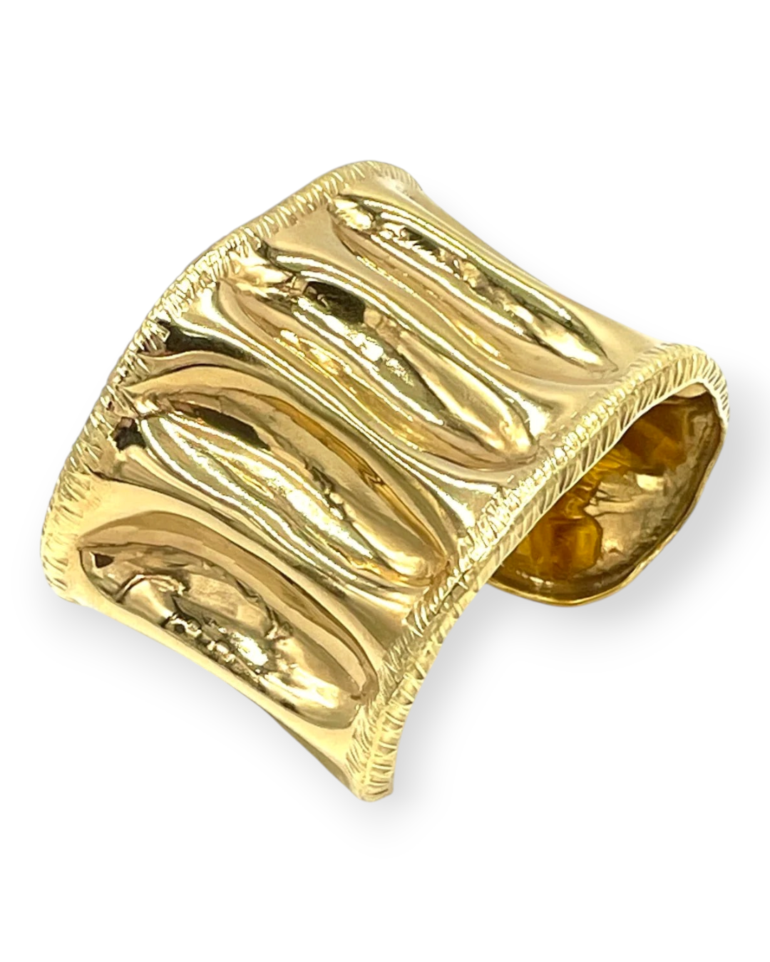 Birdie by Nina Liddle Design Chuk Chuk seed pod cuff bracelet in polished gold-tone metal with textured edges.