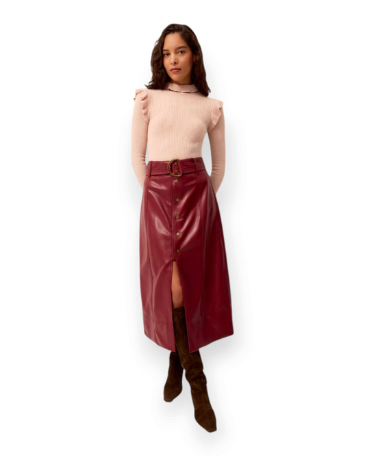 Birdie by Nina Liddle Design Chelsea skirt in brick vegan leather with snap front and d-ring belt on a model