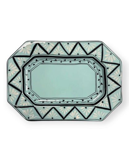 Birdie by Nina Liddle Design Gigi octagonal ceramic platter in light blue with hand-painted black and white patterns.