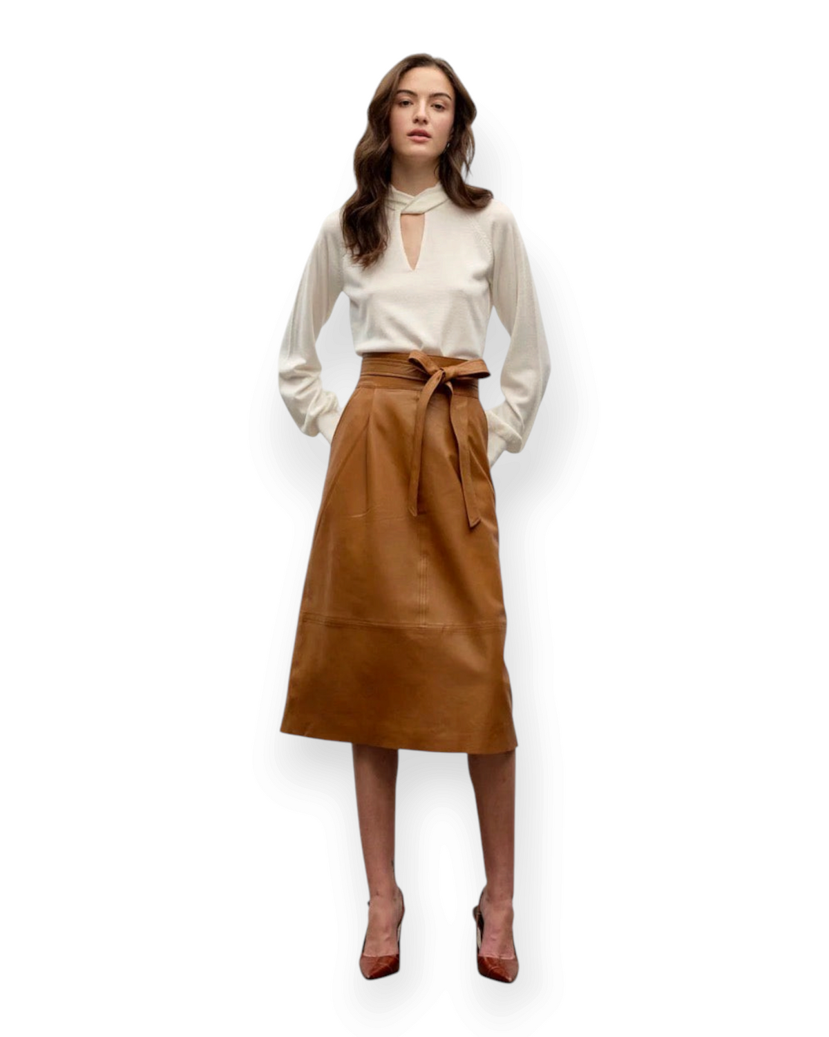 Birdie by Nina Liddle Design tan lambskin leather midi skirt with front pleats, waist belt, and raw-edge hem.