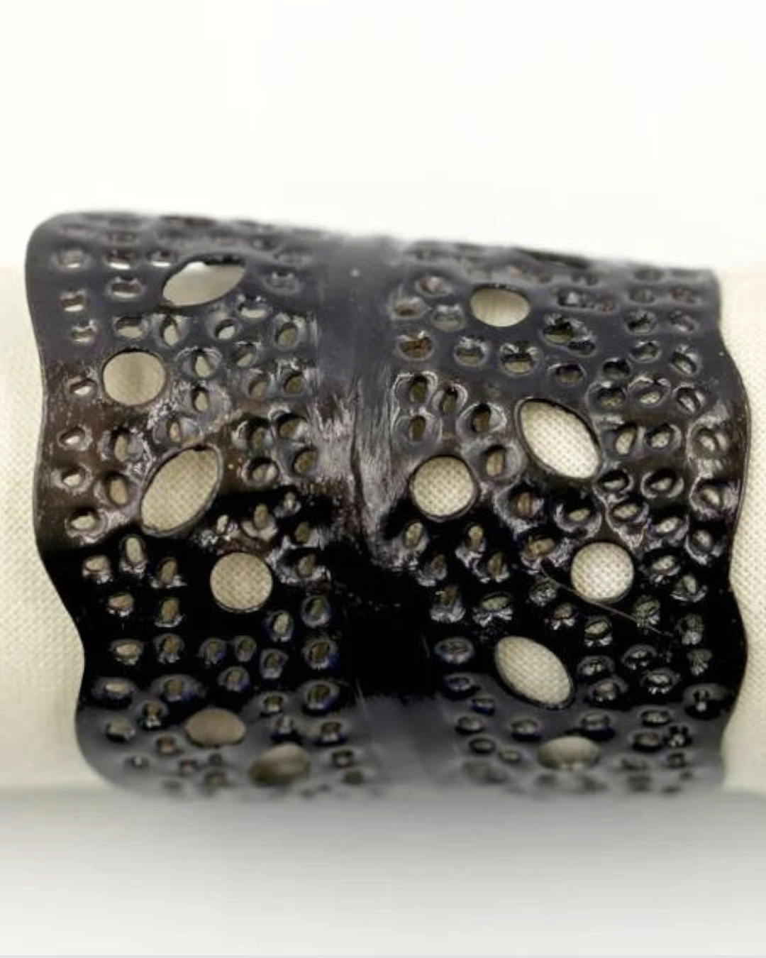 Birdie by Nina Liddle Design black hand forged sea kelp napkin ring with organic cut-out patterns