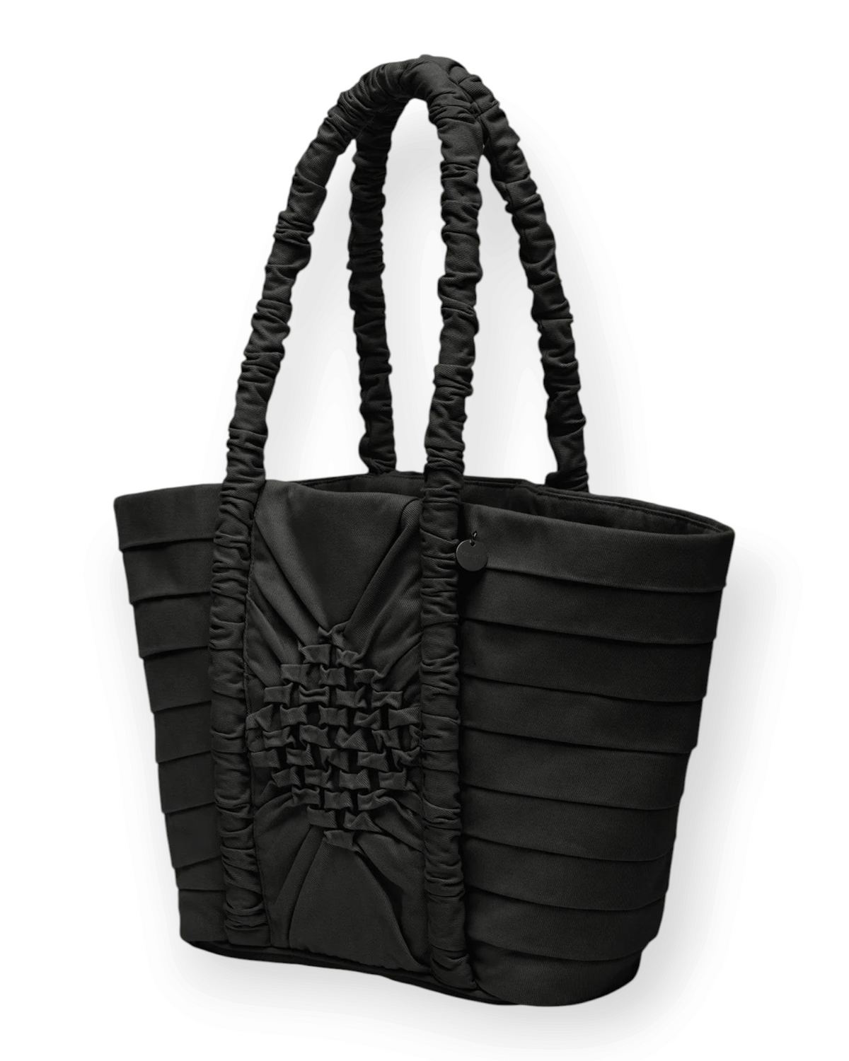 Birdie by Nina Liddle Design black cotton twill Miren bag with geometric smocking and ruched handles.