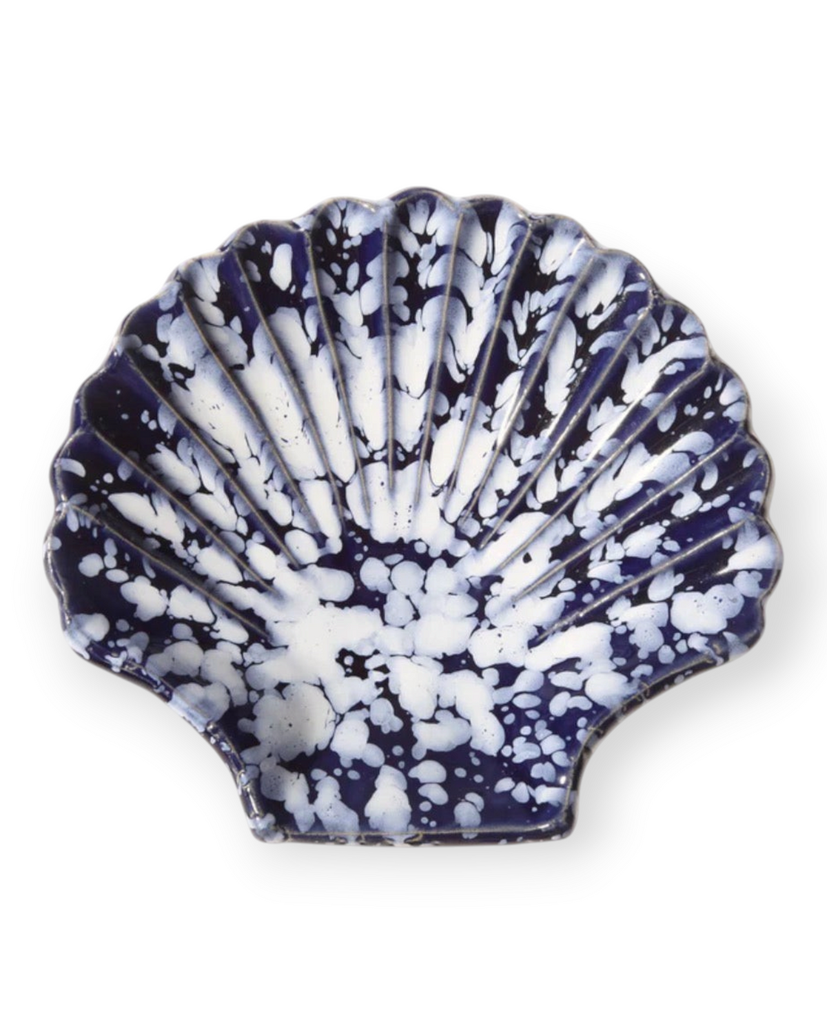 Birdie by Nina Liddle Design Concha small ceramic plate in a blue and white shell shape with a speckled glaze finish.