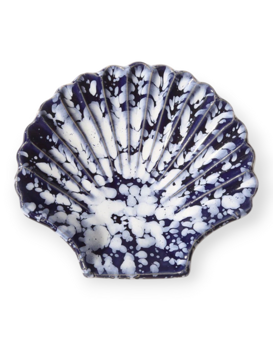 Birdie by Nina Liddle Design Concha small ceramic plate in a blue and white shell shape with a speckled glaze finish.