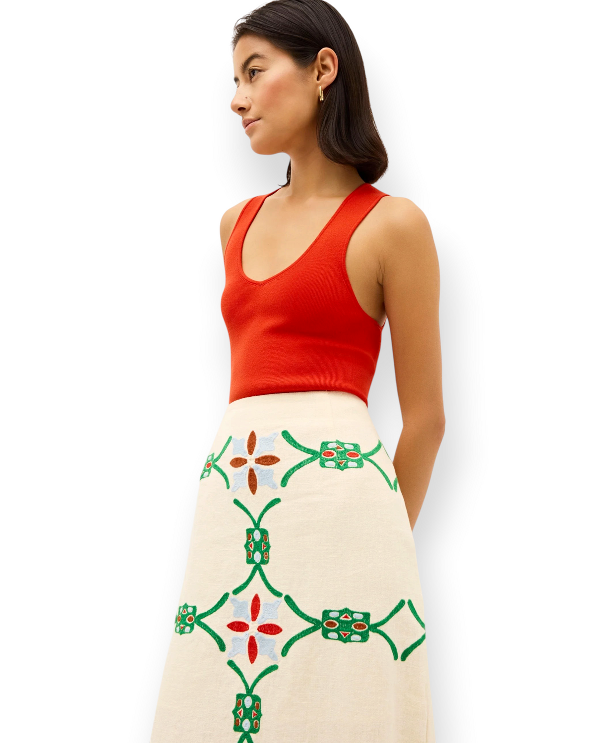 Birdie by Nina Liddle Design Miranda tank in vibrant red ribbed knit fabric worn with an embroidered cream skirt