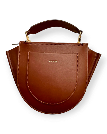 Birdie by Nina Liddle Design Hortensia bag in brown Italian calf leather with a rounded silhouette and gold hardware.