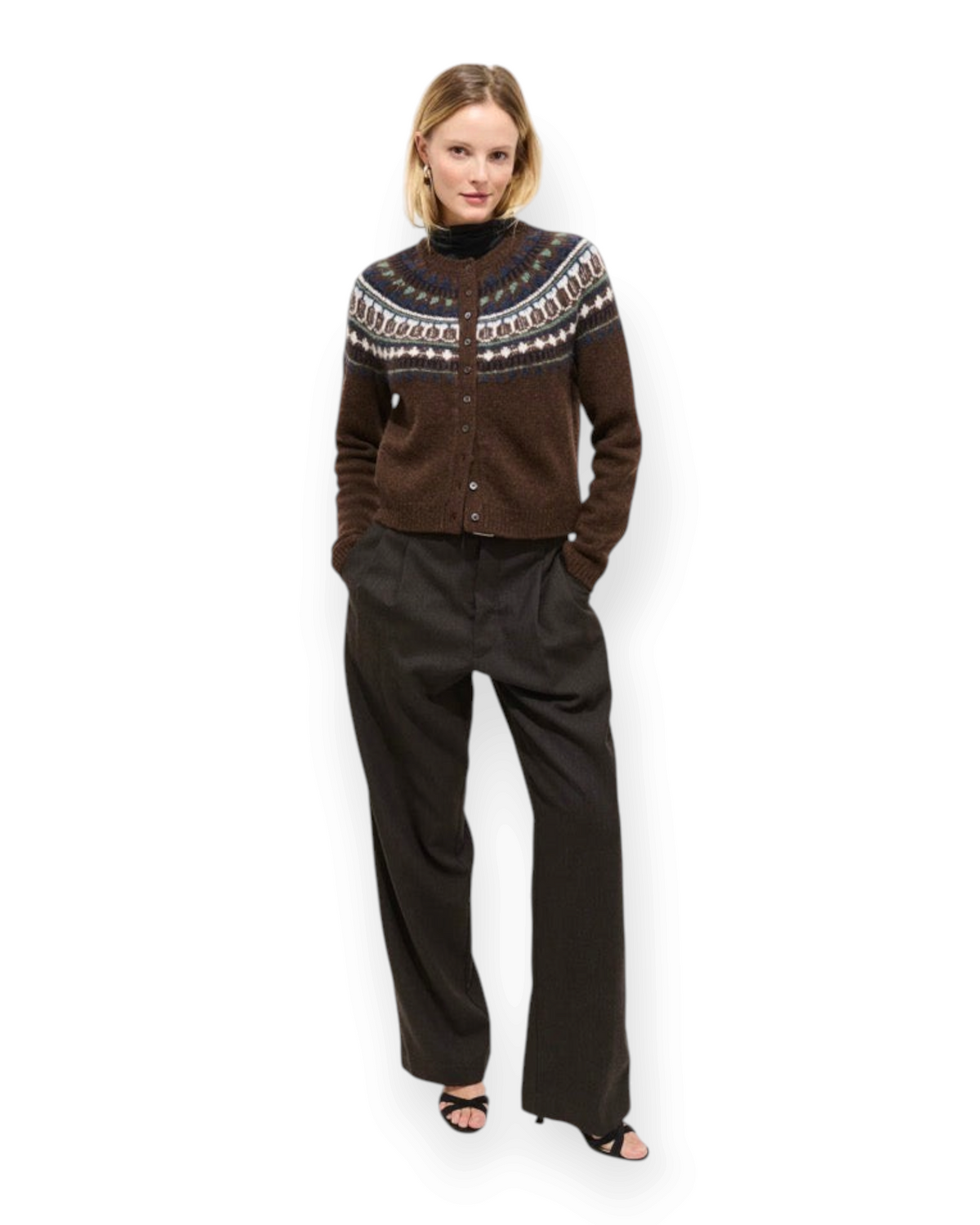 Birdie by Nina Liddle Design brown wool Fairisle cardigan with shell buttons worn by a model in dark trousers