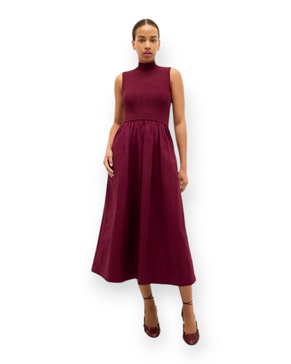 Birdie by Nina Liddle Design Yana maxi dress in Potion red-purple with a mock turtleneck and full gathered skirt.