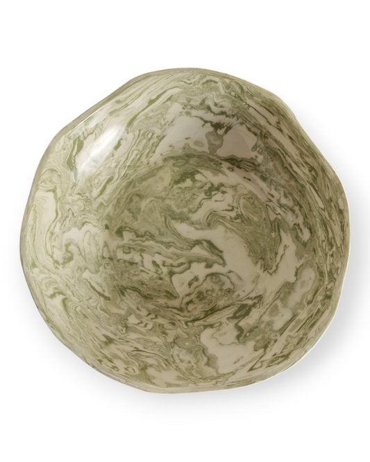Birdie by Nina Liddle Design handmade green and white marbleized ceramic bowl on a rustic wooden table